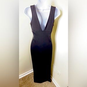 Black maxi dress with a split on the side.